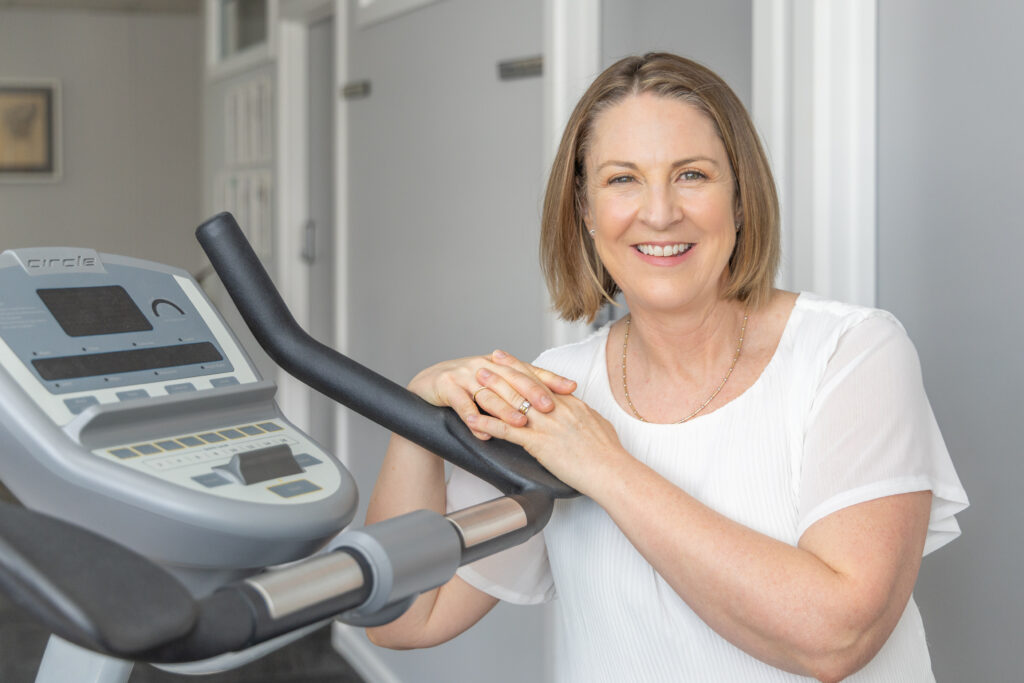 Canberra physiotherapist Linda Oerder and an exercise bike at her Health Space Woden practice.