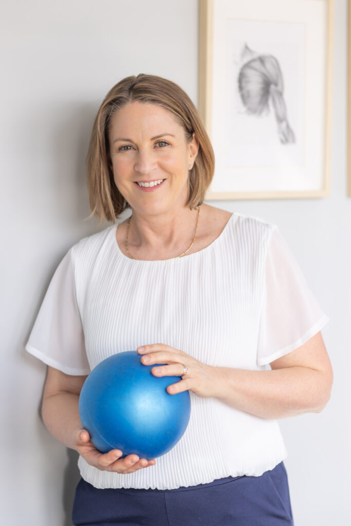 Canberra physiotherapist Linda Oerder holding an exercise ball at her Health Space Weston practice.