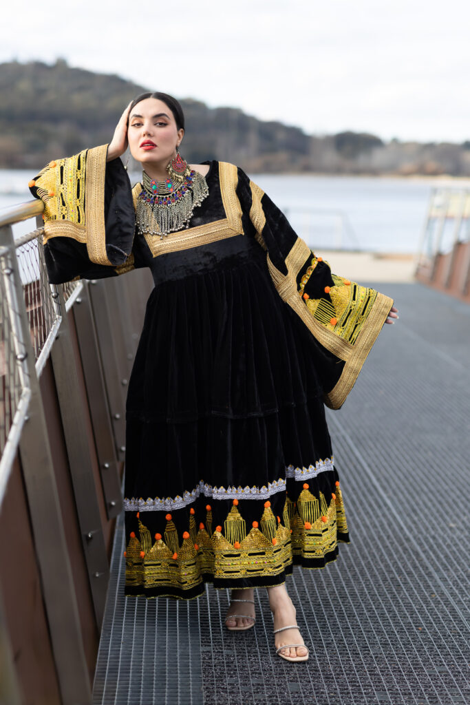 Woman wearing Afghan-inspired RAAZ brand dress, at Kingston, Canberra